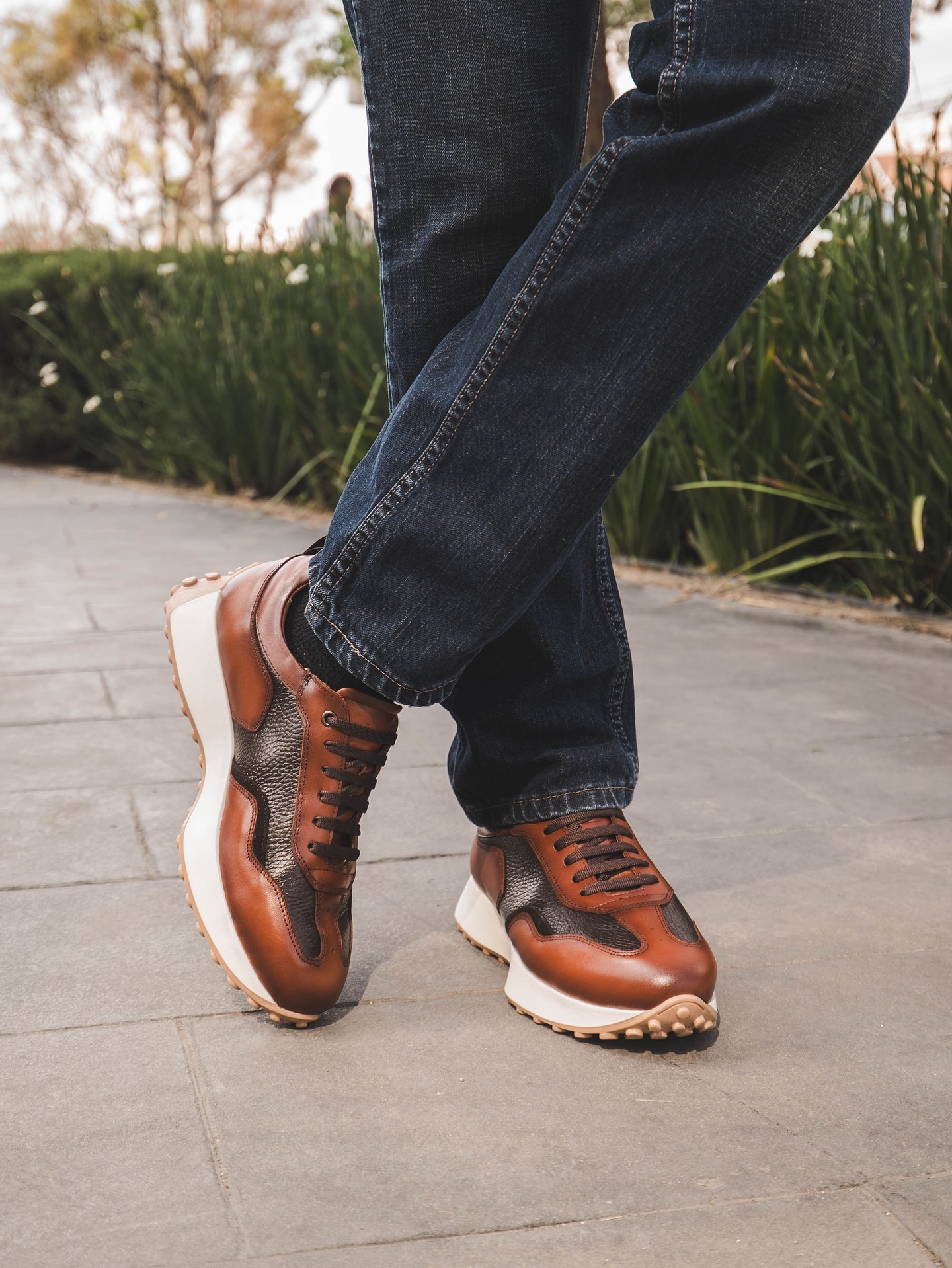 Premium leather shoes detail — texture and craftsmanship