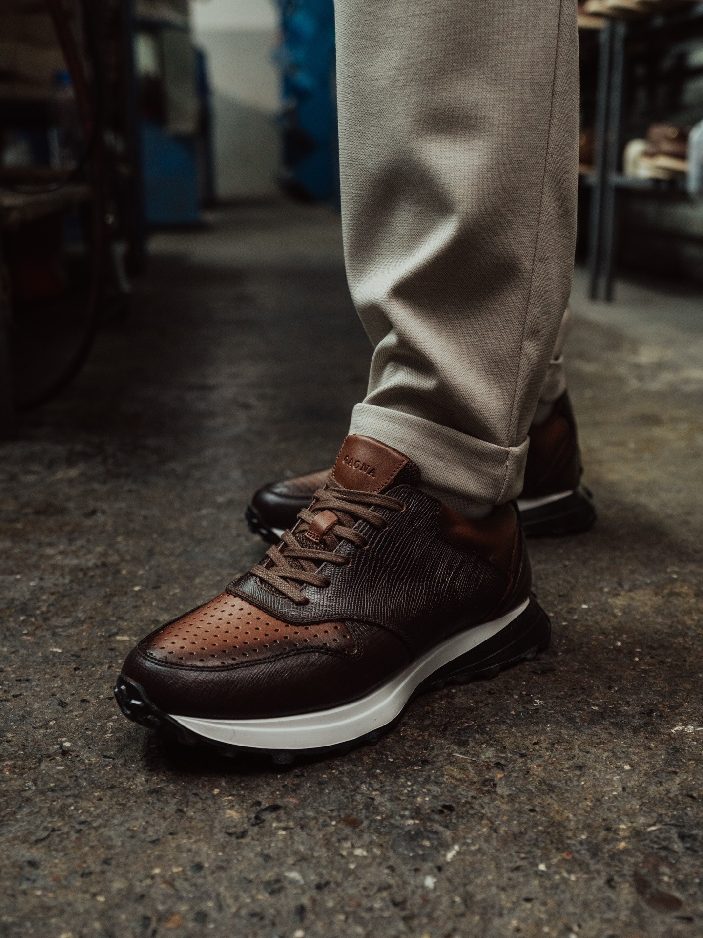 Luxury leather shoes in an editorial studio composition
